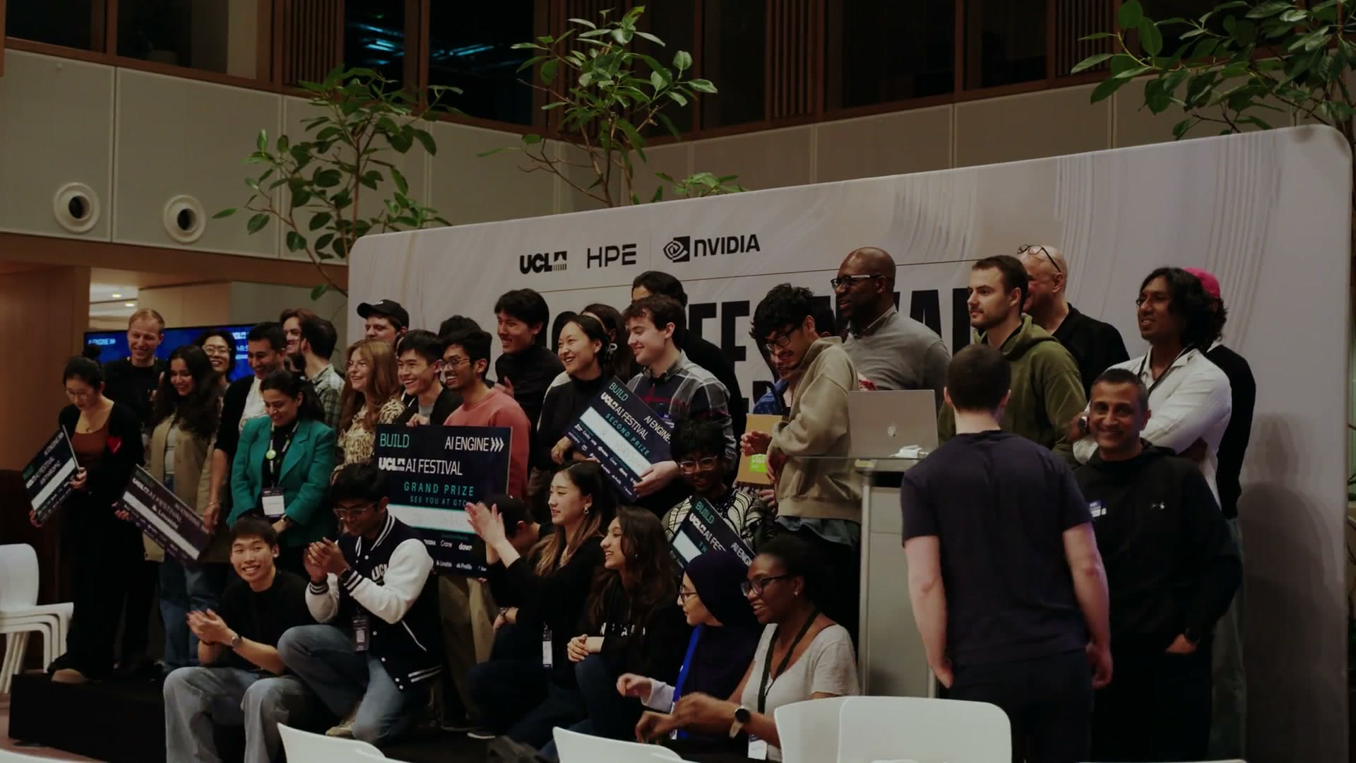 The audience at the UCL AI Festival, on their feet and applauding